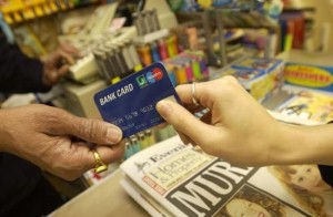 A new system in place will lessen the gap between large and small debit card issuers.