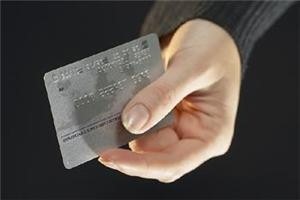 Americans played a larger part in their improved credit card standings than previously thought.